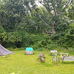 Large backyard with the fire ring
