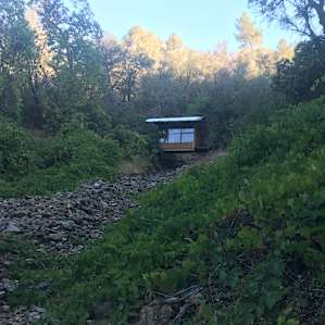 Bridge cabin up over the creekbed