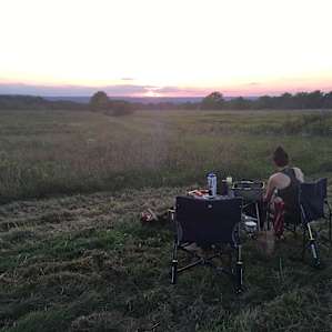 Watching the sunset by the fire at the first camping area