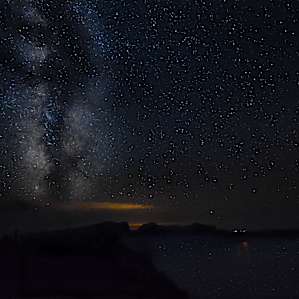 Crater lake with the Milky Way and stars reflecting from the water. It was quite magical.