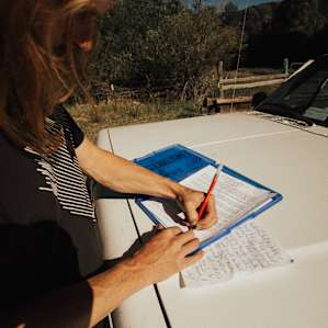 Once you park your car, fill out the sign-in sheet in the blue folder