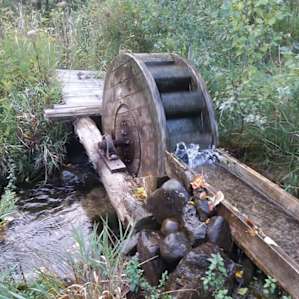 The water wheel a short distance away, providing a nice flop, flop, flop in the back ground.