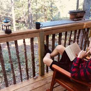Enjoying coffee and a book on the porch