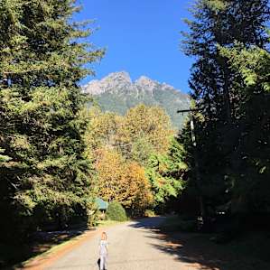 walking through the neighborhood with gorgeous autumn mountains overhead