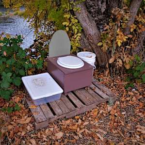 The very clean pit toilet.