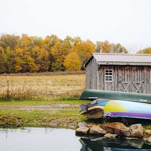The beautiful pond is equipped with canoes and kayaks.