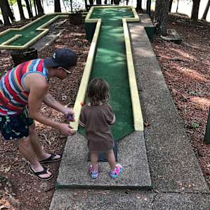 The mini golf course overlooks the lake.
