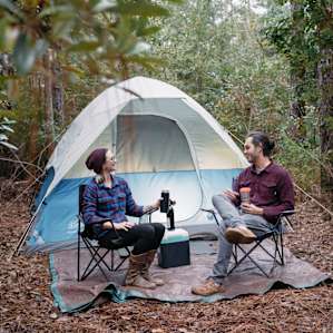 Checking out on of the pre-setup "glamping" spots. Huge air mattress already set up inside the tent.