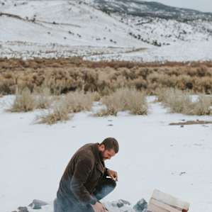 Building a fire in the snow