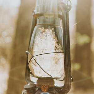 The fire ring is equipped with a couple of lanterns and chairs for your use.