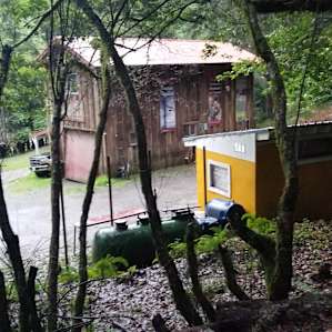 View from the blue cottage porch looking towards shower room