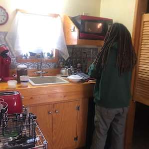 cooking breakfast in the kitchenette - stocked with most of your basic necessities (pots, dishes, coffee, spices, condiments, etc) and a few snacks
