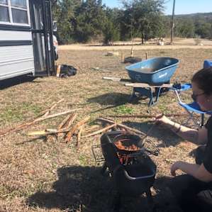 cooking breakfast - we were able to haul plenty of dry cedar wood from the back yard with this handy wheelbarrow