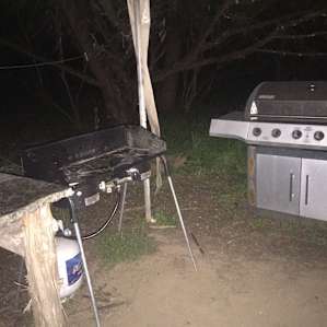 The outdoor kitchen, not seen in this picture is a nice bar height table to sit at