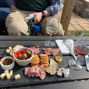 Great wine with cheese and meat tray