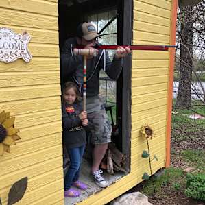 Playing in the kids play shed