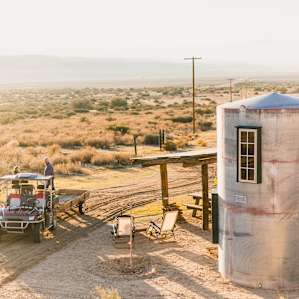 The Glamp Tank affords an amazing view of the desert and sunset. Fortunately, Jim supplies two chairs exactly for this.
