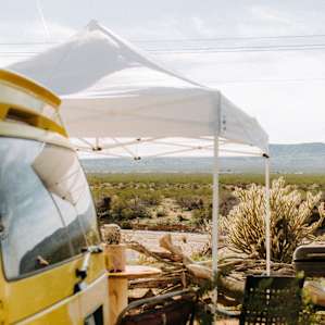 The camping area with the canopy to keep the sun off you! As well as Melanies cute yellow van that you can sleep in!