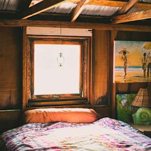 This cozy loft bed gets tons of light.