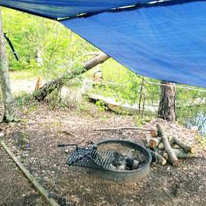 My fiance set up a Lean-to shelter over the tent so we could still cook and hang out despite the weather.