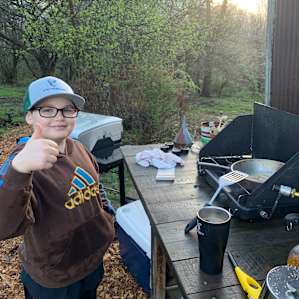 Cooking in the open air kitchen.
