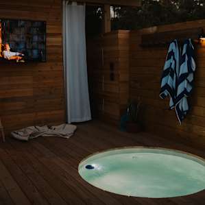 This was my all-time favorite setup. Chilling in the hot tub while watching our favorite shows on the TV! It was so perfect!