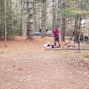 I was standing at our tent, past my husband is the shower and bathroom