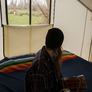 Super cozy canvas tents! Come with 2 large cots that can be pushed together!