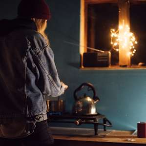 Cooking up dinner under the twinkly lights.
