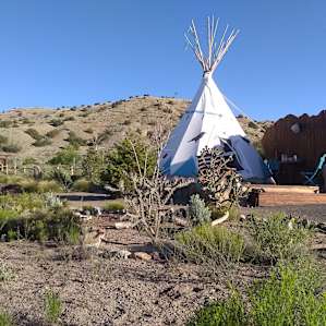 Tipi stands on a wooden platform and is very spacious.