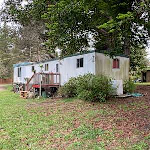 The trailer, where there is a bathroom available for campers to use.