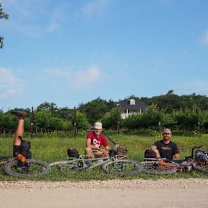 Made some attempts at a group photo with the vineyards and house.