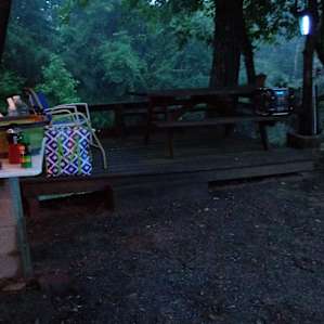 Picnic table on balcony overlooking the river.