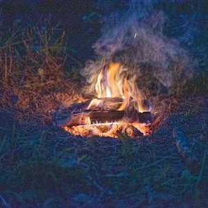 It doesn't matter the temperature, you gotta have a fire when camping.