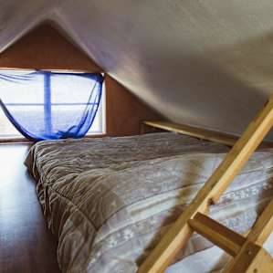 Double bed in the loft upstairs