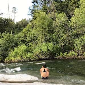 There's a nice, wide, flat expanse of rock to relax on by/in the river.