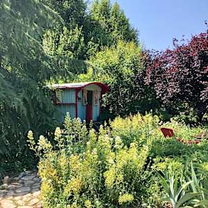Beautiful gardens surround the setting.