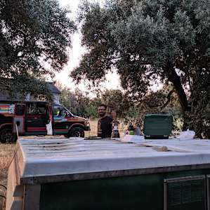 We set up our grill on an old camper they have parked nearby