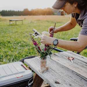 Sellers picked some wild flowers from the property to make a centerpiece for the picnic table.