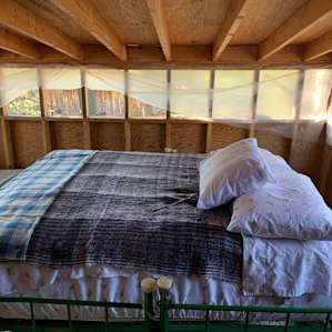 This the touch we put on our cabin. Put two beds together and inflated an air mattress.