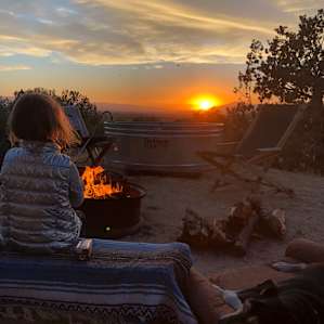Roasting marshmallows at sunset
