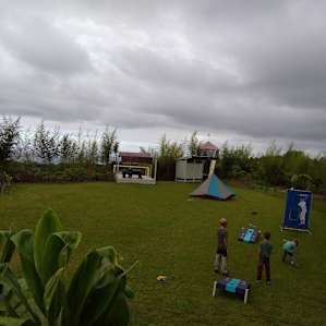 We chose to pitch our tent on the grass instead of under the pavilion in the back. The yard is secluded and great.