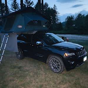 RTT by the river. **we were supposed to be in site 4 farther from river. They had a last minute cancellation and offered site 2 to use but set up rig at site 4. They then offered that we could drive down to site, i think it’s not always going to be drive up.