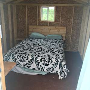 Wood cabins or tent sites.