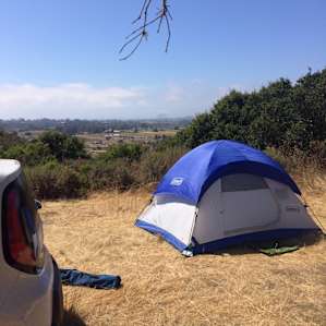 This is where we pitched our tent, looking out to Morro Rock in the distance. Big oak tree behind camera.
