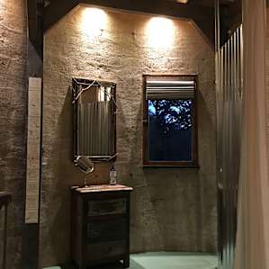 Bathroom; admiring the decor.