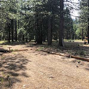 Clearly marked parking area, with the site to the right