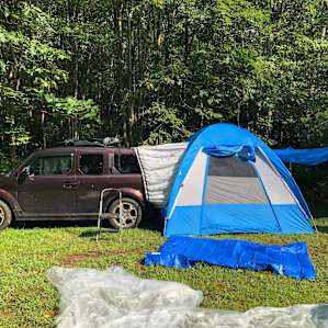Our first time in the car tent was a success! After an evening of heavy rains, we were grateful for the sunshine the next day. Packing up was bittersweet.