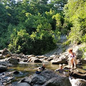 Playing in the river nearby the farm