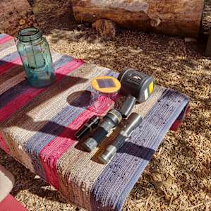 Flashlights and Lantern on the picnic table
